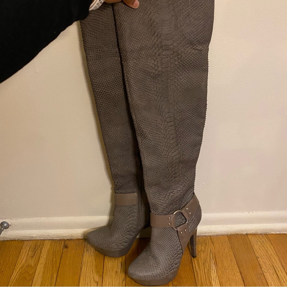 Jessica Simpson over the knee heeled boots.
